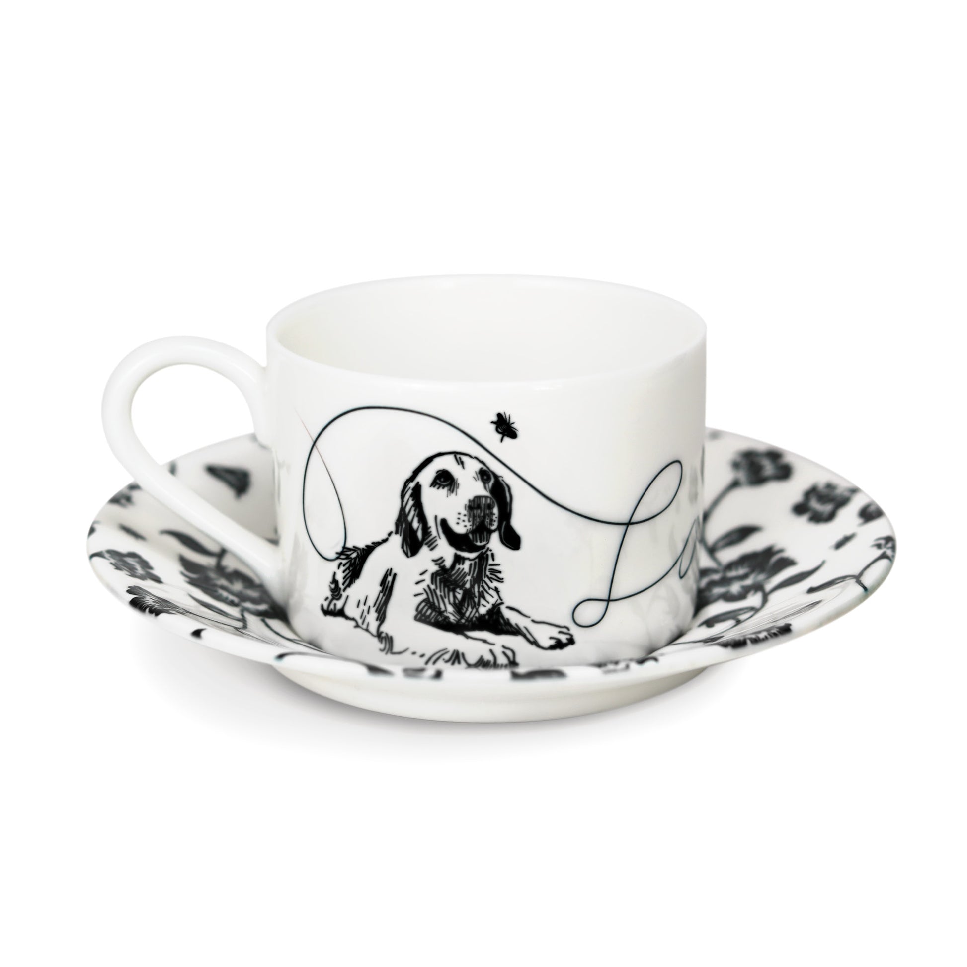 Cup and saucer featuring a hand-illustrated dog design.