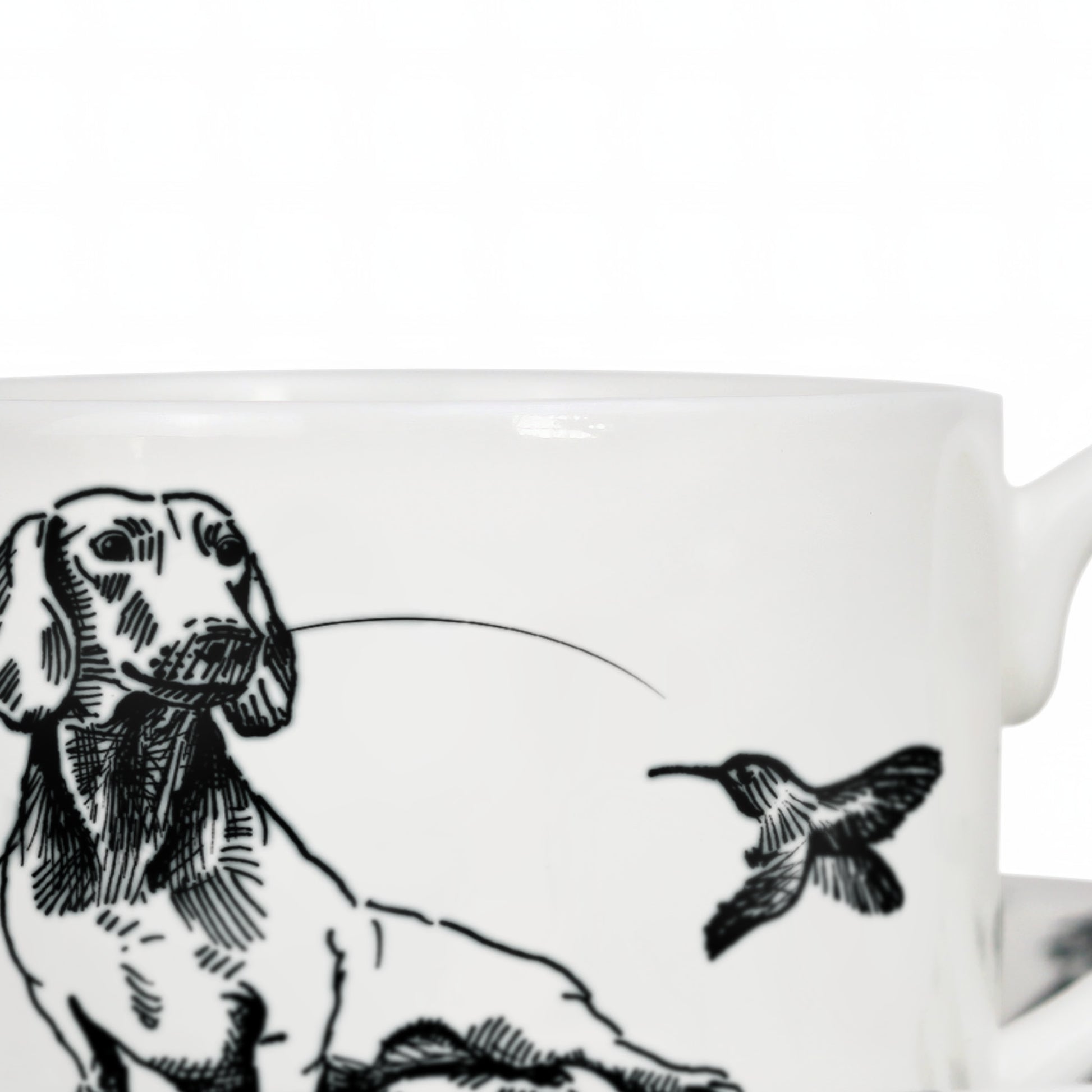 Close up of sustainably printed dog illustration design on bone china cup